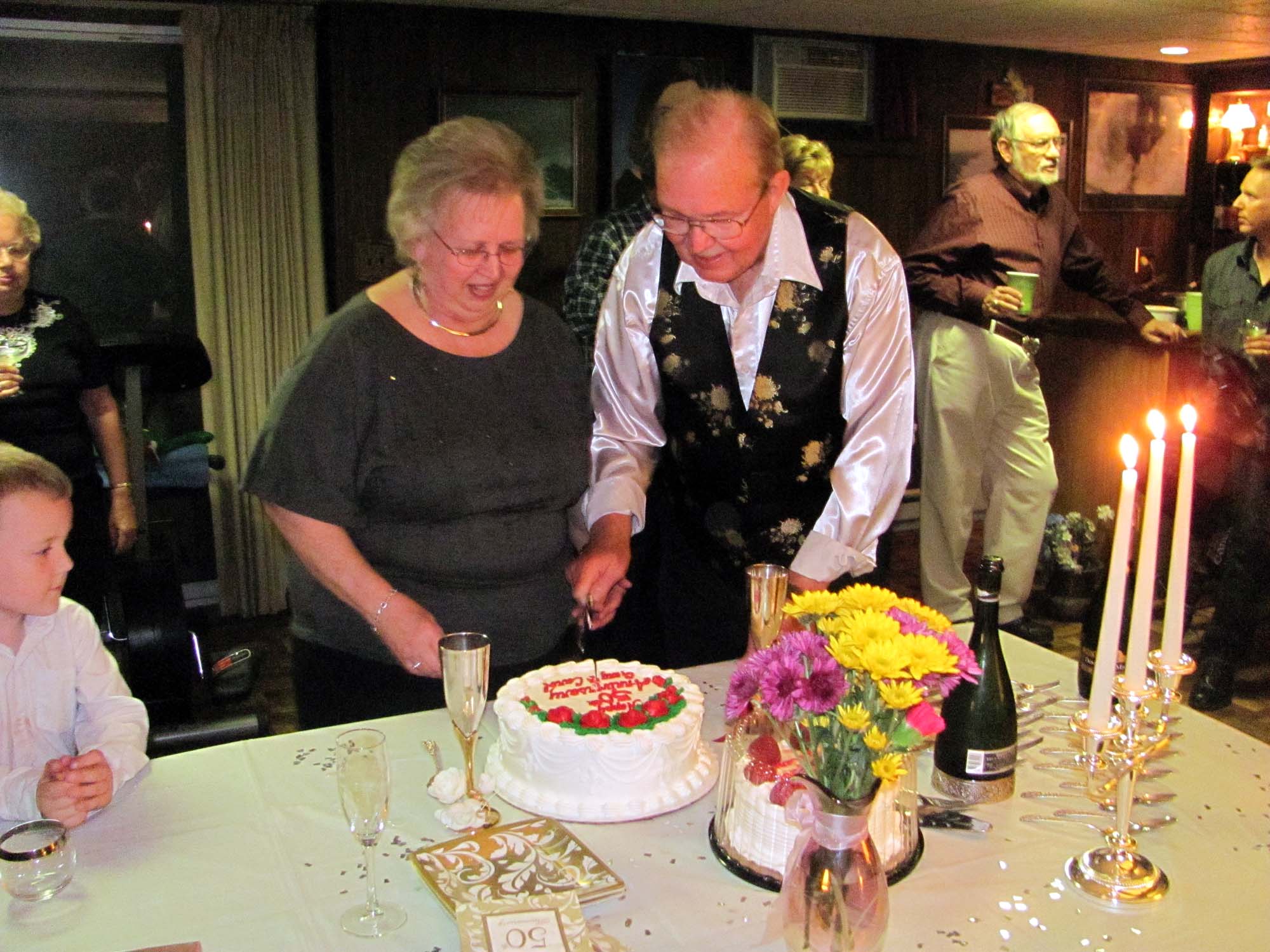 Gary Carol Cutting Cake.jpg